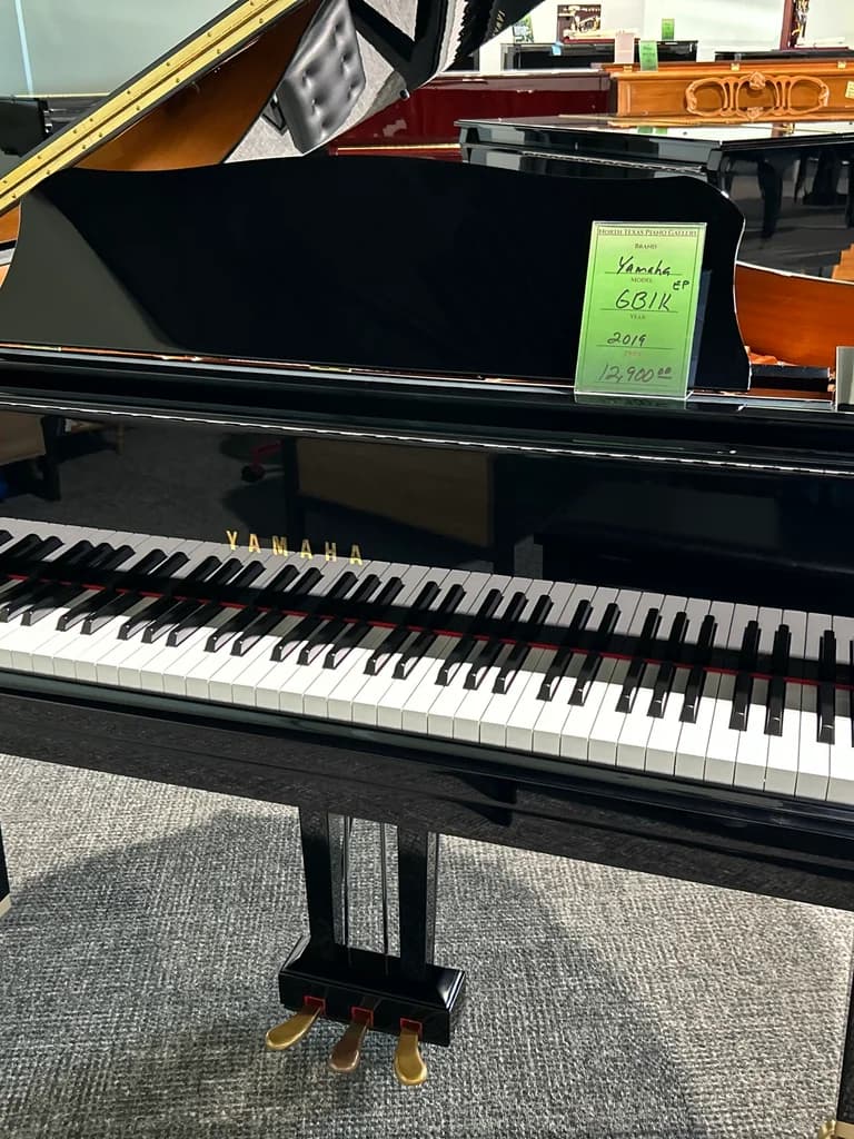 2019 Yamaha GB1K baby grand piano in polished ebony, front view